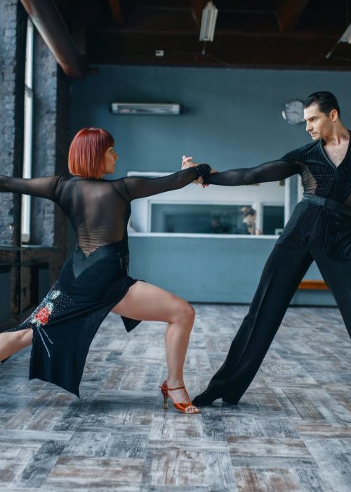 two-dancers-in-costumes-on-ballrom-dance-training.jpg